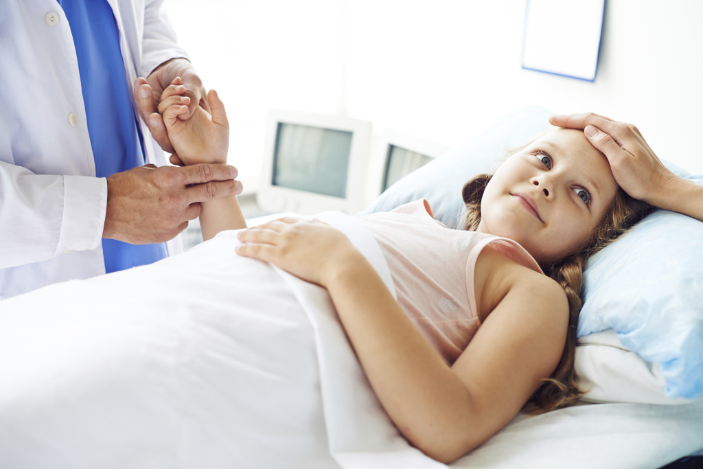 Girl in hospital bed